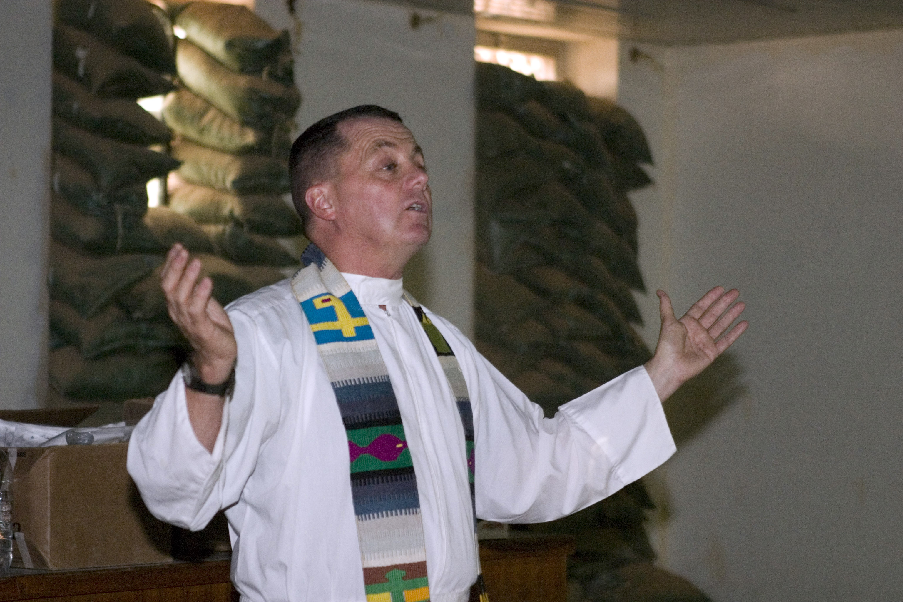 US Navy 070517-M-7772K-008 Cdmr. Dennis J. Rocheford, a Navy chaplain, preaches to Marines attached to the 2nd Platoon, Alpha Company, 1st Battalion, 2nd Marine Regiment, during a Catholic mass service at Forward Operating Base