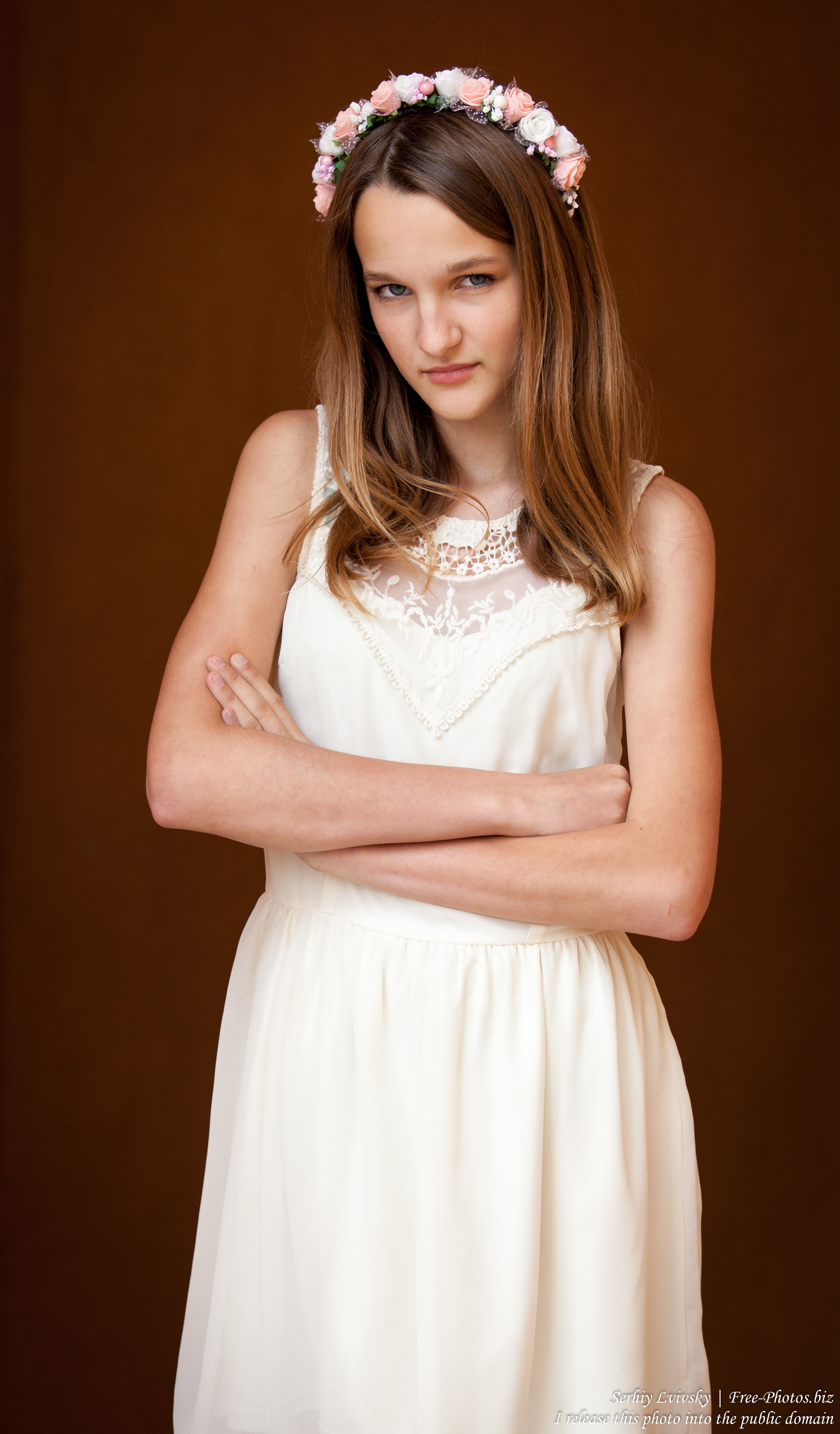 a 13-year-old Catholic girl in a white dress photographed in June 2015, picture 13