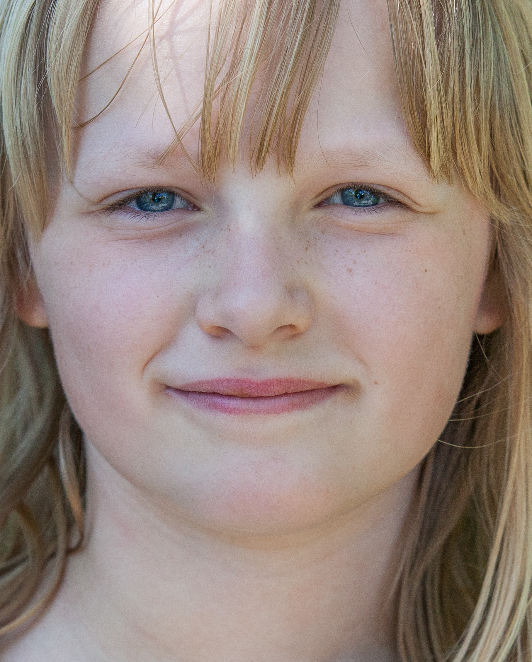 a cute fair-haired girl in Copenhagen, Denmark, in June 2014, picture 13