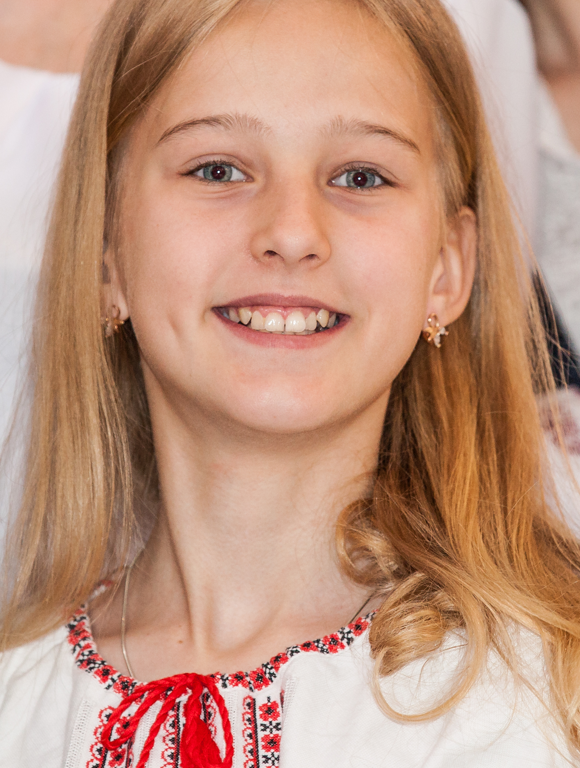 a young blond girl photographed in a Catholic church in May 2014, picture 2/2