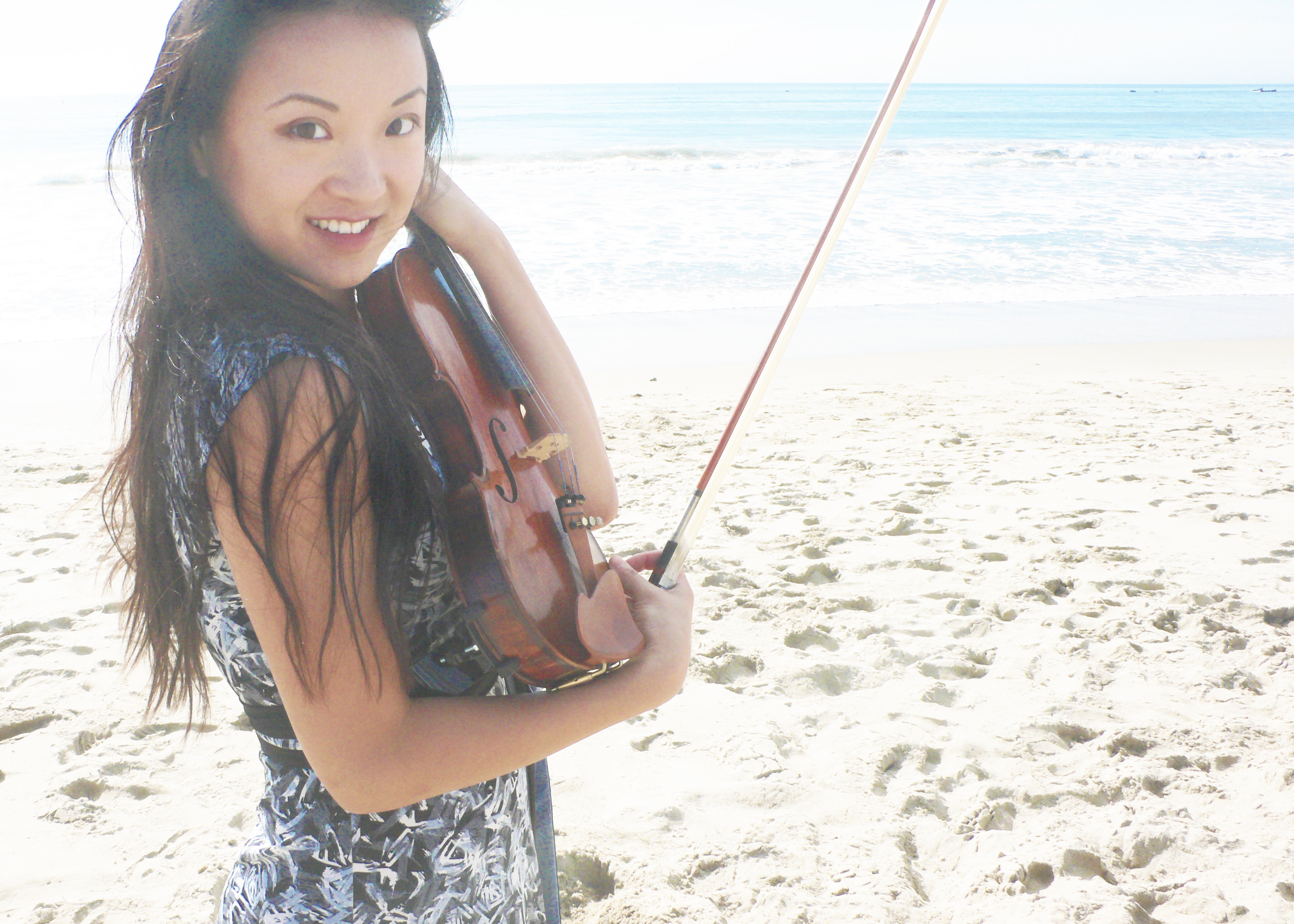 Lily holding a violin, cropped