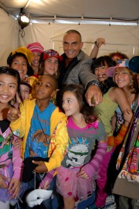 Christain Audigier backstage during LA Fashion Week with children models wearing Ed Hardy apparel. - Photo by Glenn Francis of www.PacificProDigital.com
