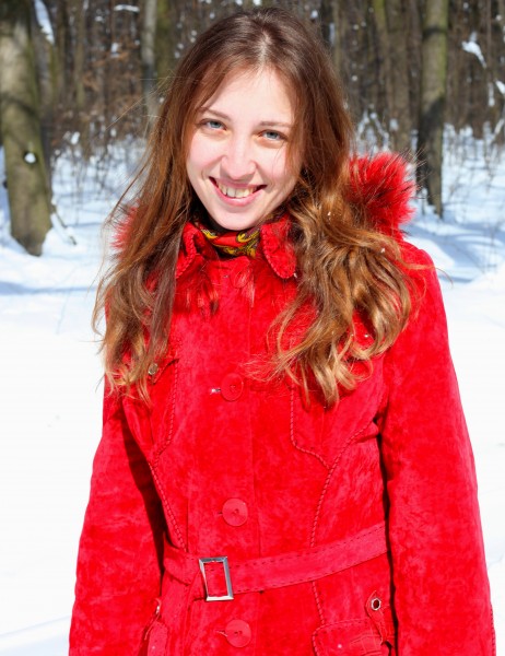 a charming beautiful attractive young Catholic woman in a snowy forest, photo 5