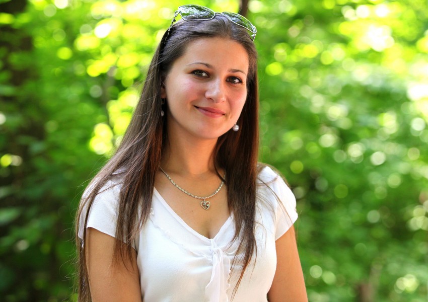 a smiling pretty brunette girl (Catholic), photographed in July 2013, picture 9/22