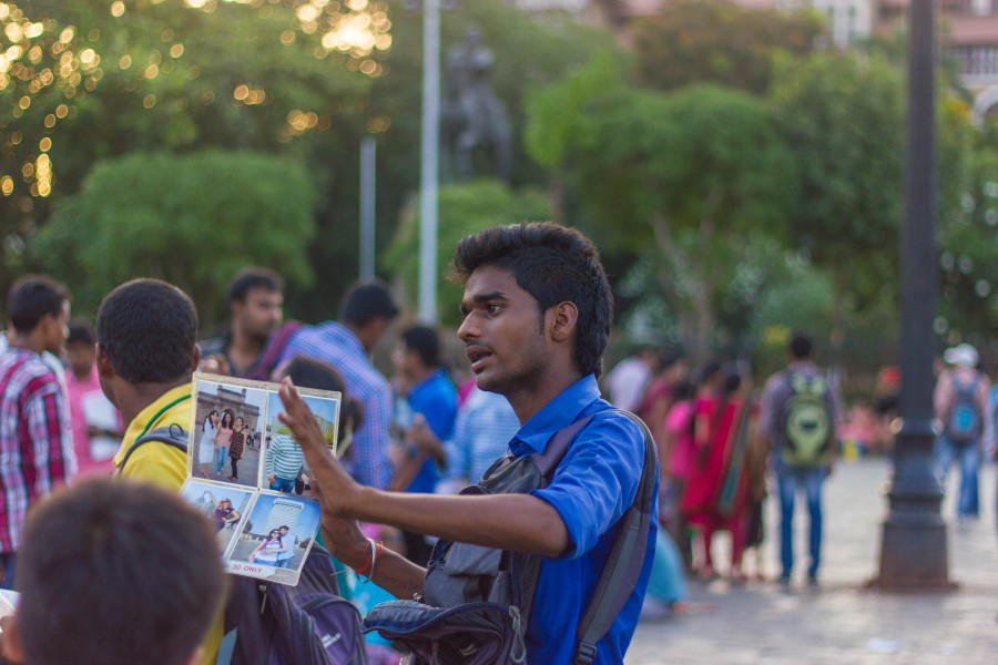 A photographer advertising his sevices at the Gateway of India (18566738741)
