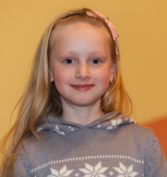a young Catholic blond pretty girl photographed in March 2014