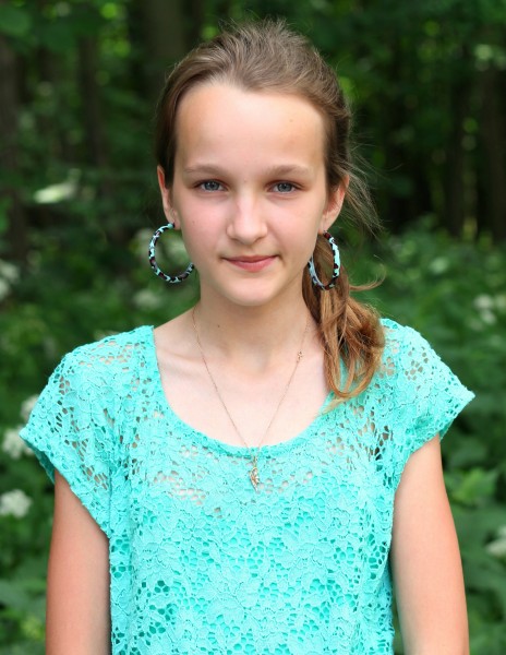 a really beautiful girl with huge earrings, photographed in June 2013, portrait 11/27