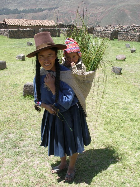 Andean woman and child wear woolens