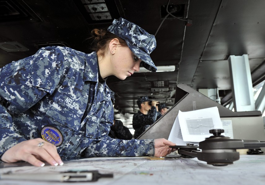 Defense.gov News Photo 110127-N-6003P-027 - Petty Officer 3rd Class Sarah Nelson uses a parallel motion protractor to plot the position of the aircraft carrier USS Harry S. Truman CVN 75 as