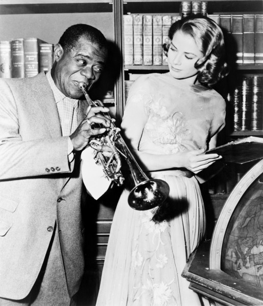 Louis Armstrong and Grace Kelly on the set of 
