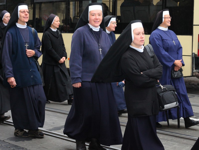 Catholic nuns on a procession during a celebration