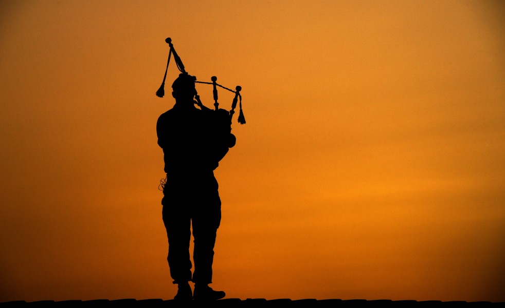 Piper with 4SCOTS Playing the Bagpipes at Sunset in Afghanistan MOD 45158080