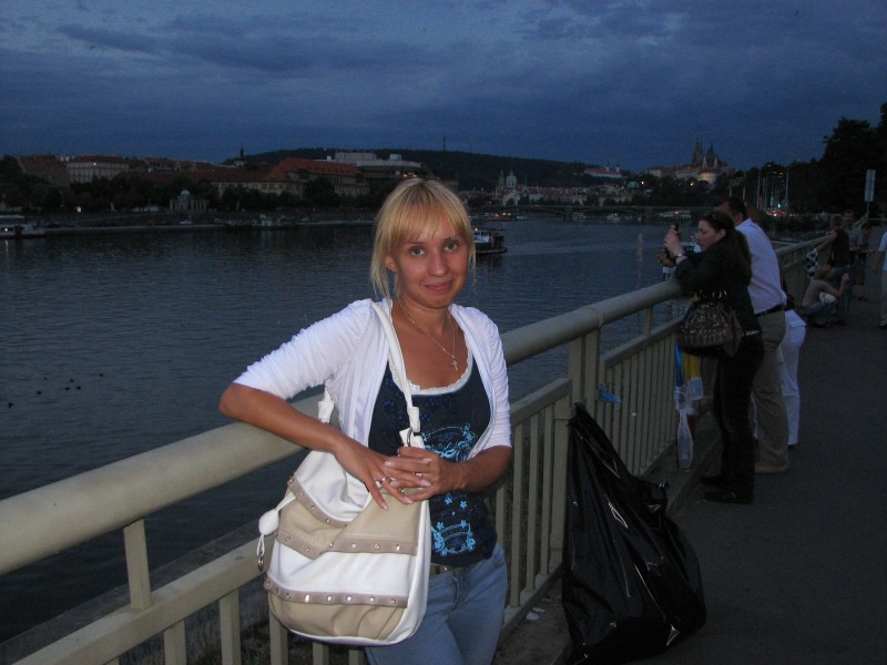 A young woman near Vltava river in Prague (Praha) city, Czech Republic, European Union, picture 35