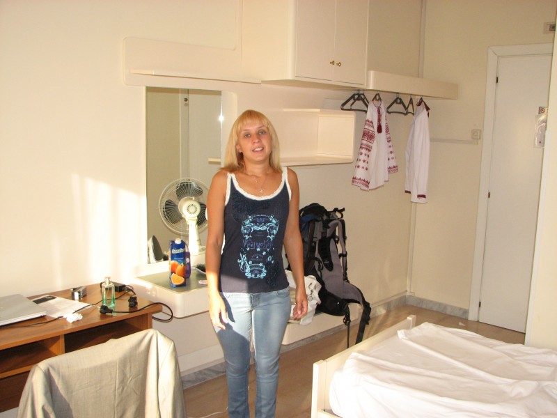 A young woman in a hotel room in Rome, Italy, European Union, August 2011, picture 1.