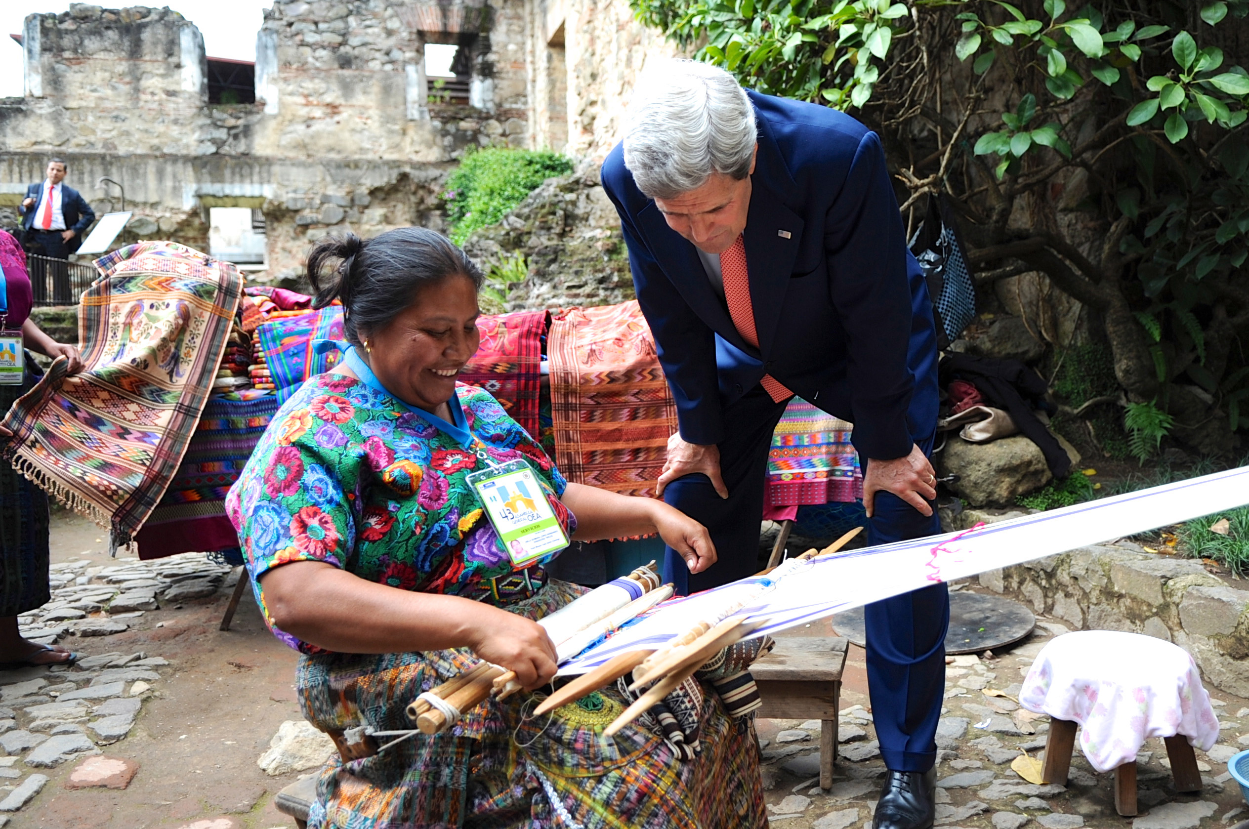 Secretary Kerry Examines Goods Made By a Textile Worker (8971071525)