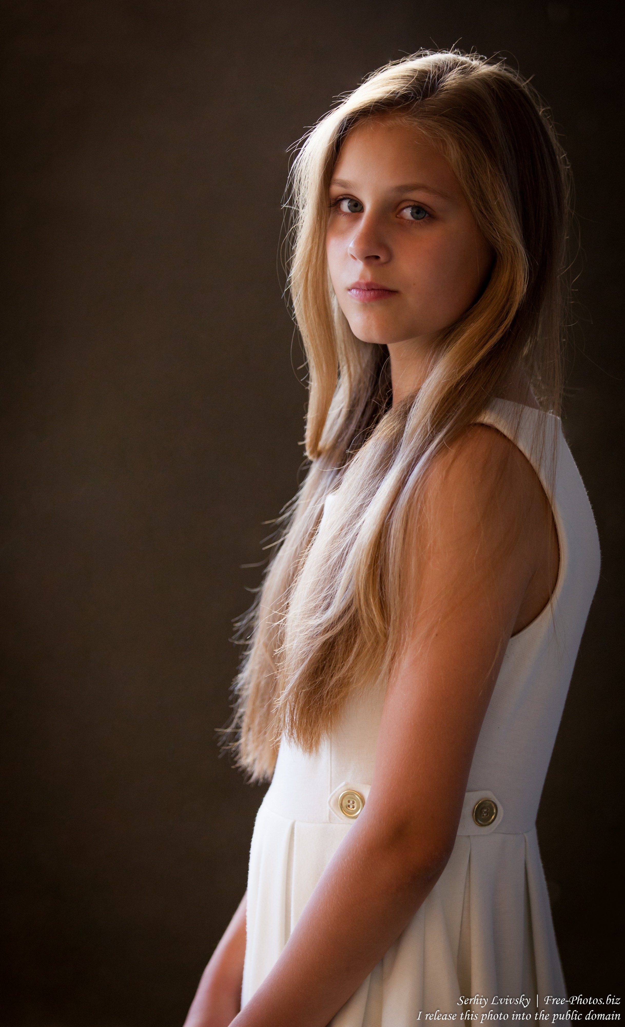 a 12-year-old blond girl wearing a white dress photographed in July 2015 by Serhiy Lvivsky, picture 4