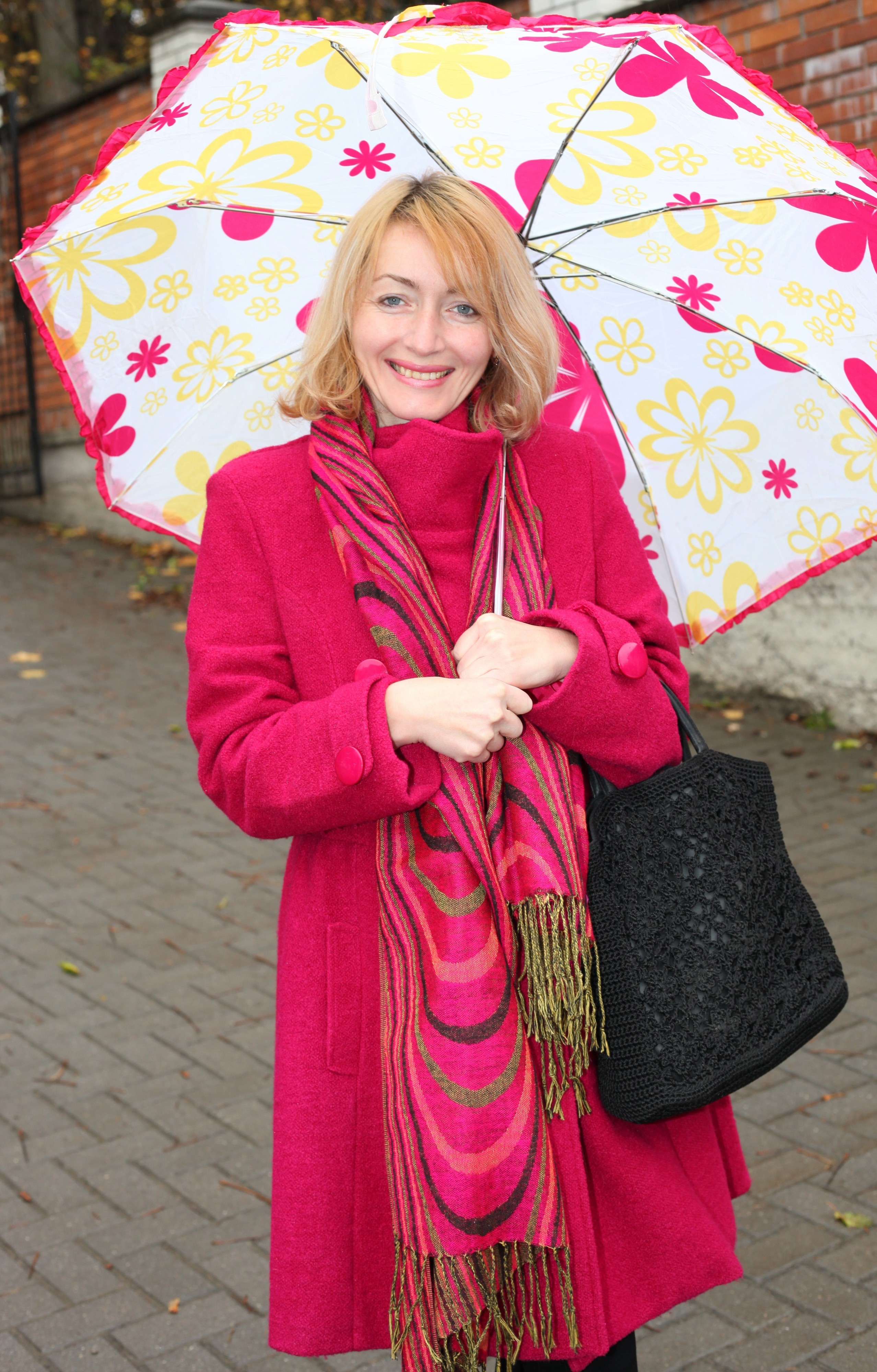 a beautiful Catholic woman with an umbrella, picture 2