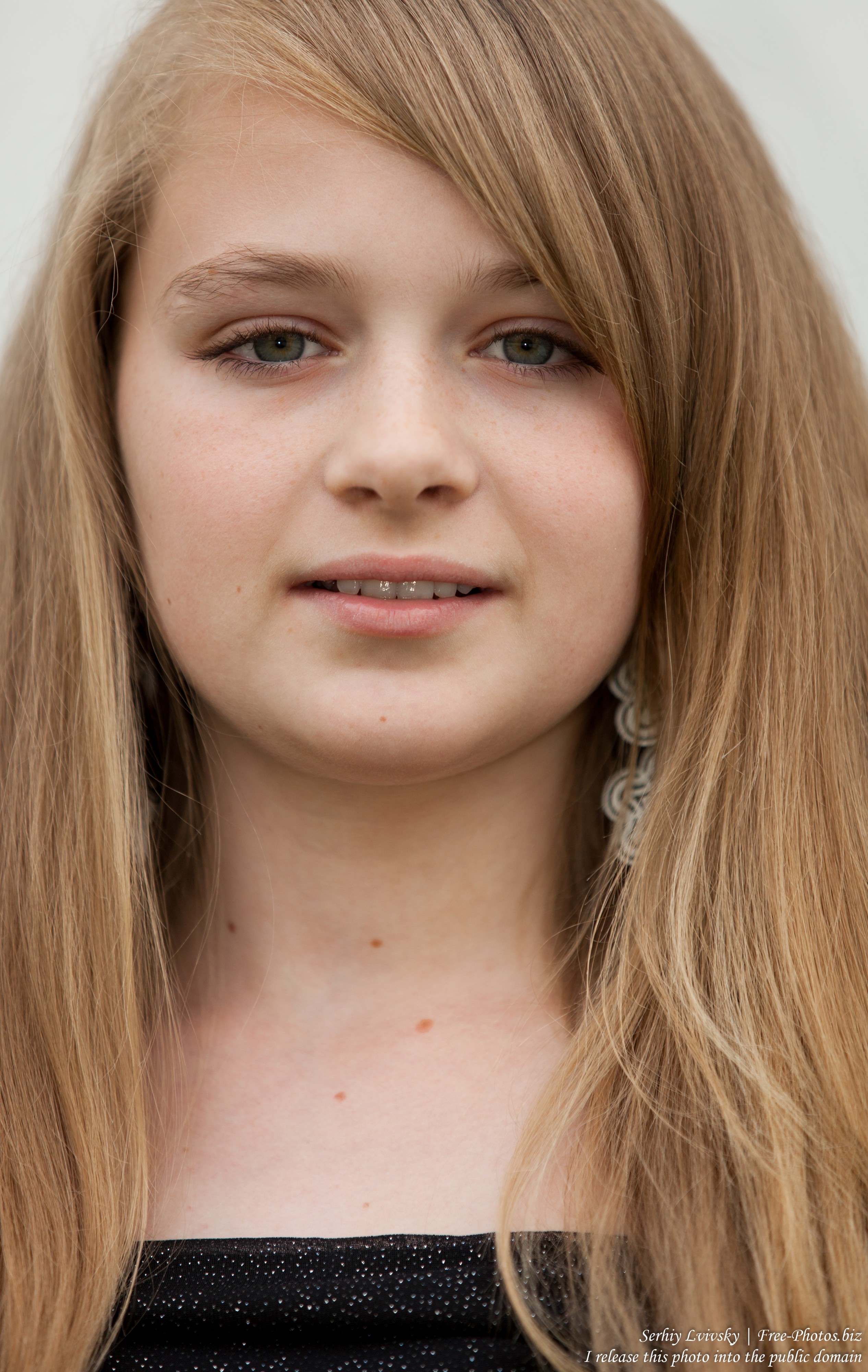 a blond 13-year-old girl photographed in June 2015, picture 6
