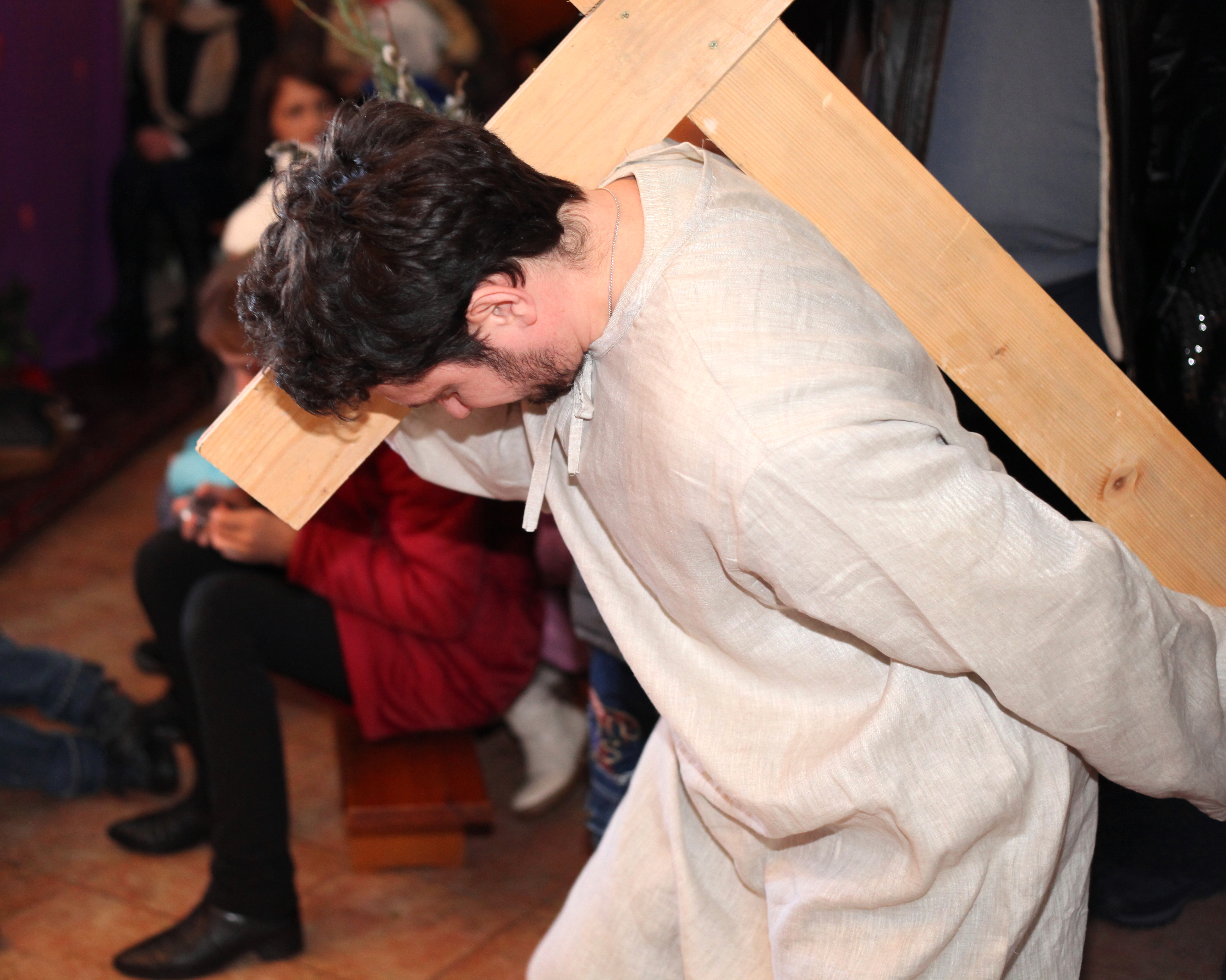 Jesus carrying cross in the Passion of the Christ performance, photo 2