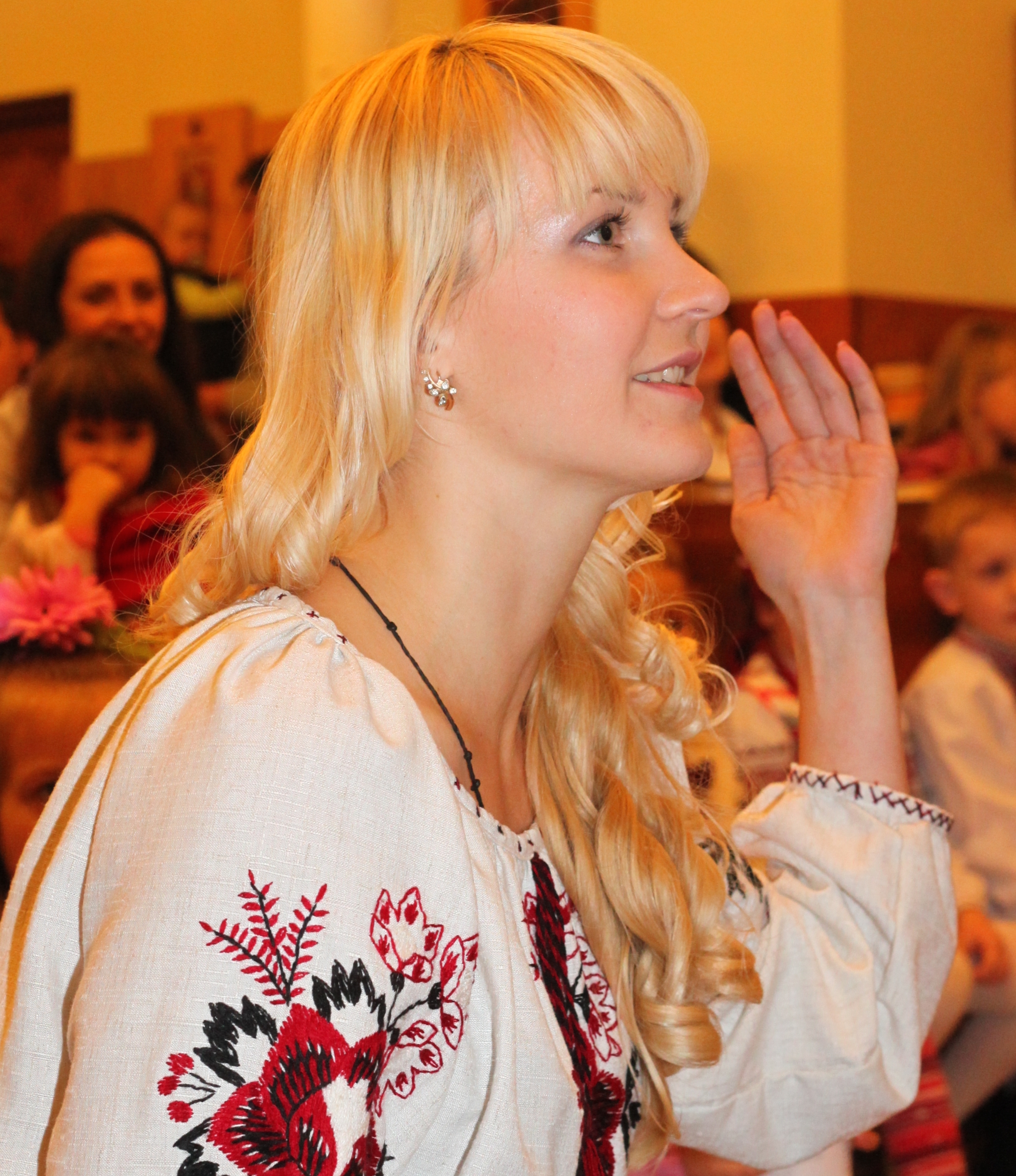 an amazingly tender, charming, feminine, beautiful young blond Catholic woman in a Church, photo 10