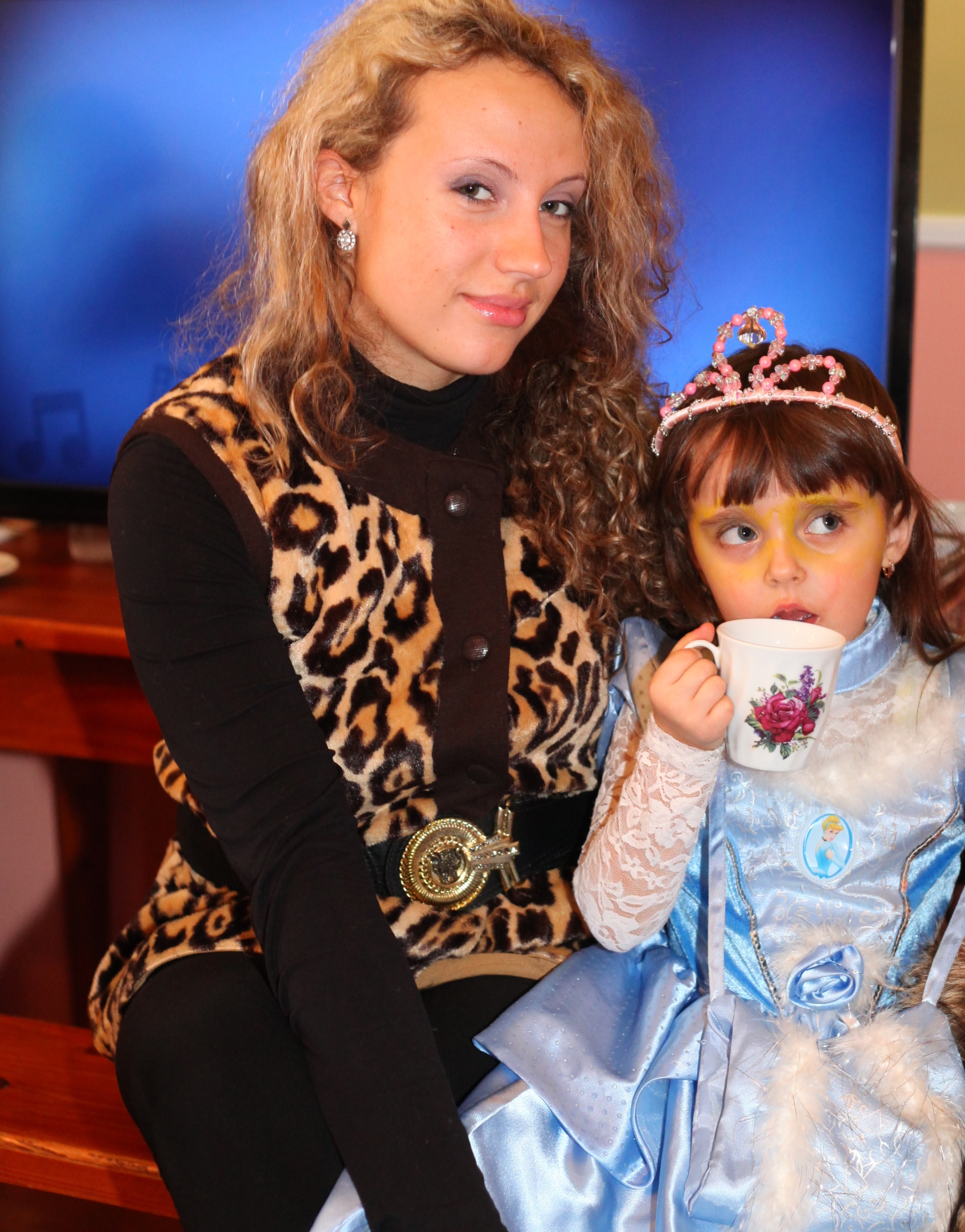 a beautiful curly woman with her daughter in a Catholic kindergarten, picture 5