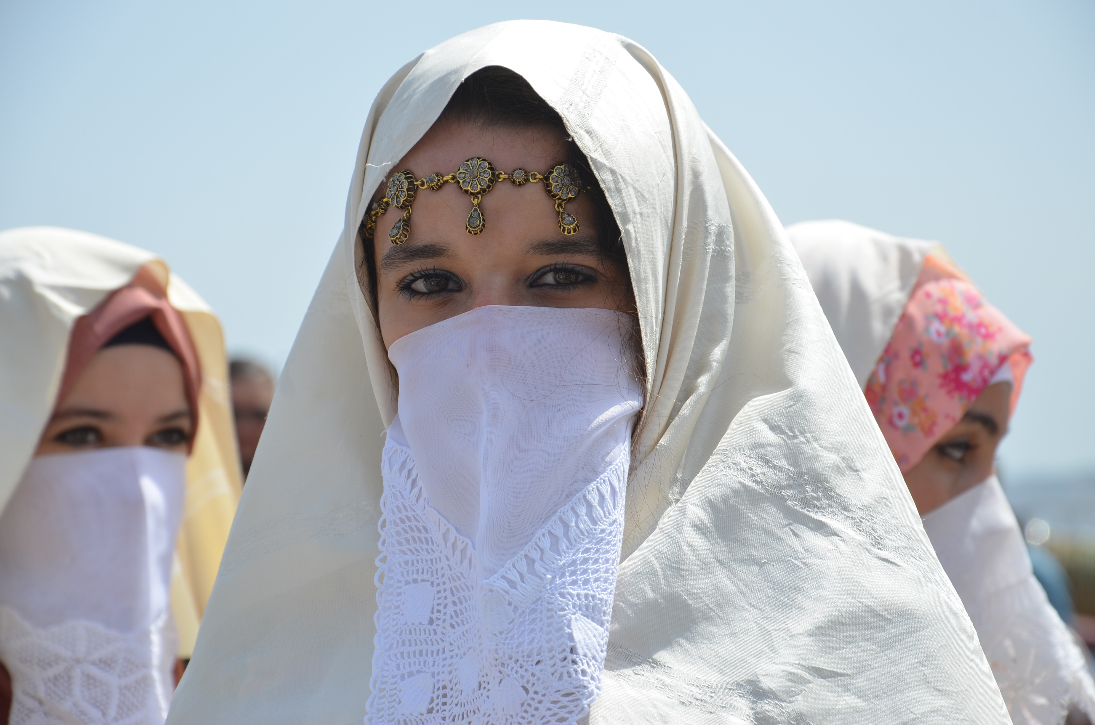 women in haïk at the port of Algiers, Algeria