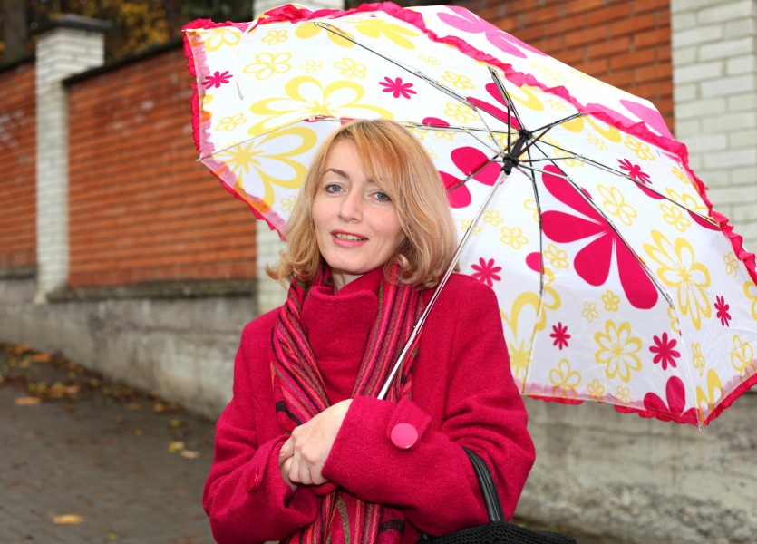 a beautiful Catholic woman with an umbrella, photo 4