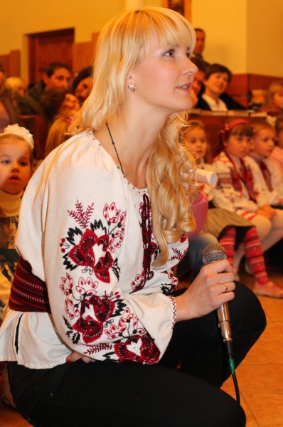 an amazingly charming and tender beautiful young blond Catholic woman in a Church, photo 13