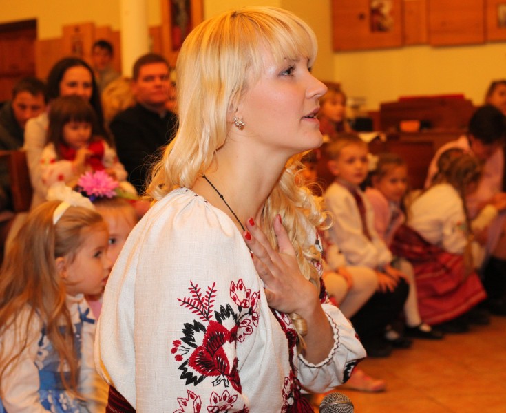 an amazingly tender and charming beautiful young blond Catholic woman in a Church, photo 7