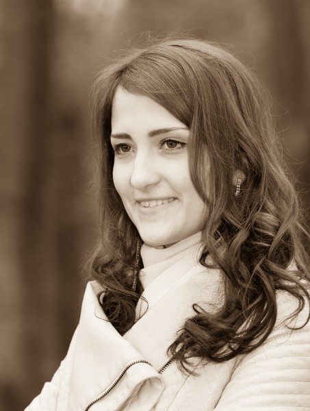 a brunette Catholic amazingly beautiful woman photographed in April 2014, black and white sepia tone, picture 9/15