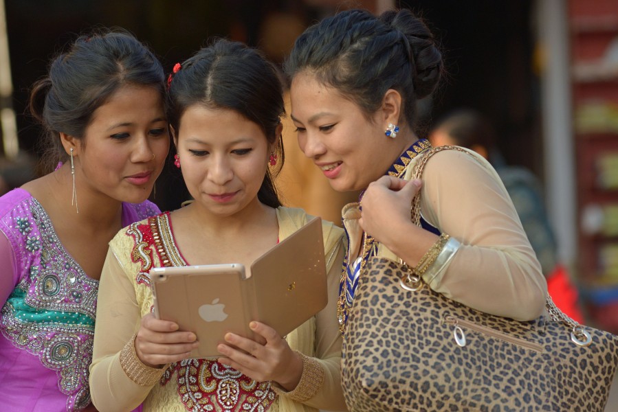 Nepali women with iPad