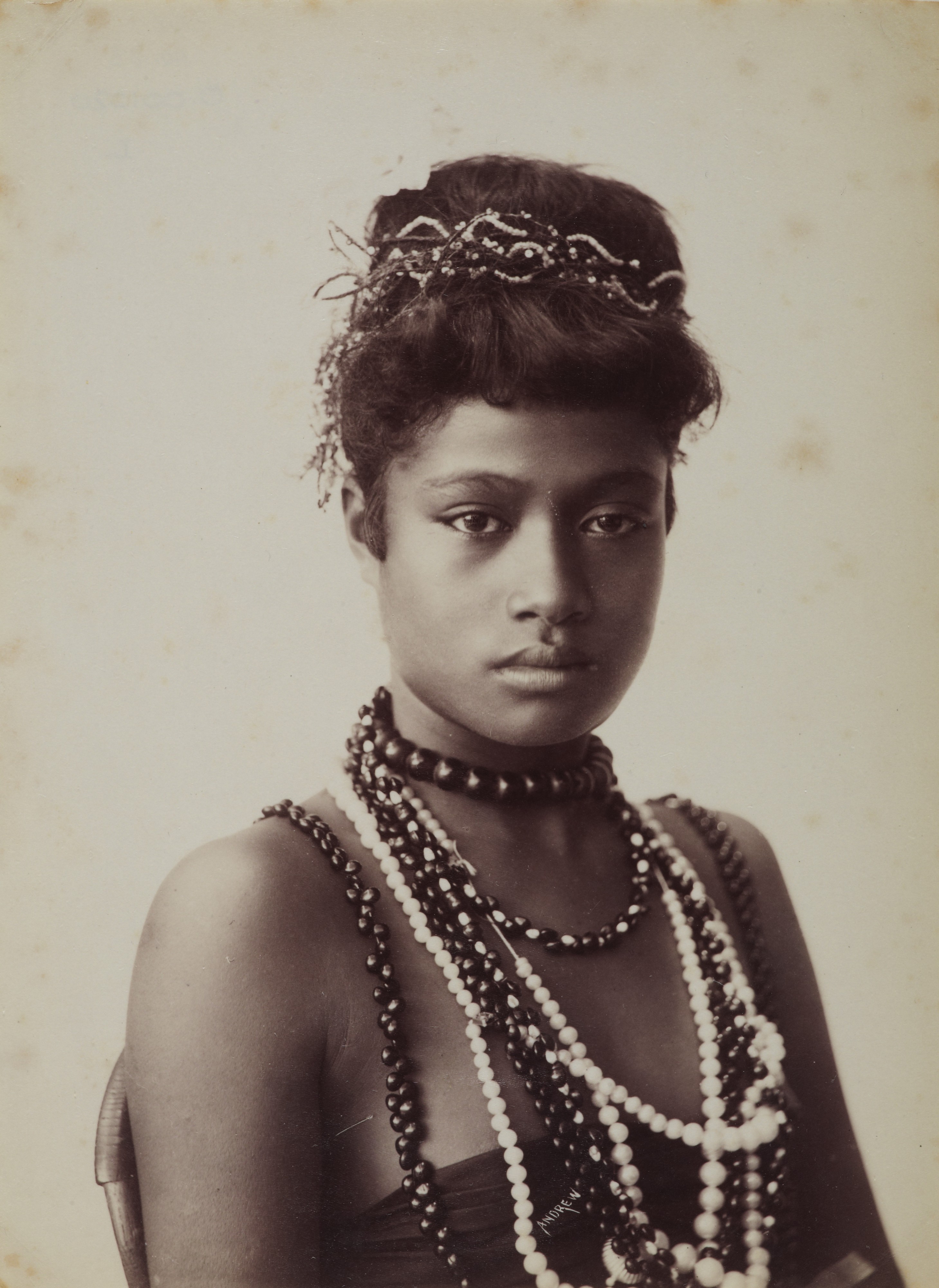 Samoan woman wearing beads, photograph by Thomas Andrew