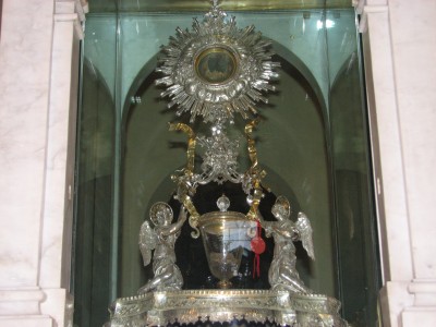 Lanciano is a town and comune in the province of Chieti, Italy. The town is famous for the Eucharistic Miracle: during the Divine Liturgy, when a priest said the Words of Consecration, with doubt in his soul, the priest saw the bread change into living flesh and the wine change into live blood, which coagulated into five globules. The flesh was found to be human striated muscular tissue of the myocardium, type AB. The blood at Lanciano has divided into five irregularly shaped pellets. At scientific examinations conducted in 1971 these pellets were found to be human blood, type AB, with proteins normally fractionated and present in the same percentage ratio as those in normal fresh blood.<br>Name of photo's author: Free-Photos.biz<br>This photo was taken in: Lanciano, Italy