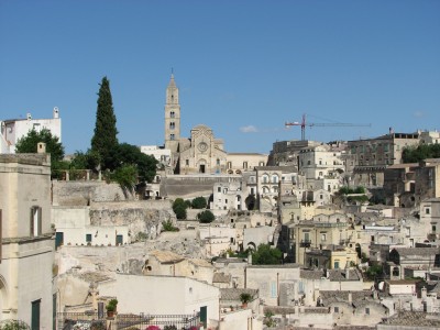 Free photo of Matera town, Italy. Matera preserves a large and diverse collection of buildings related to the Christian faith, including a large number of rupestrian churches carved from the soft volcanic rock of the region. These churches, which are also found in the neighboring region of Puglia, were listed in the 1998 World Monuments Watch by the World Monuments Fund.<br>Name of photo's author: Free-Photos.biz<br>This photo was taken in: Matera, Italy