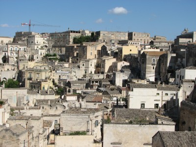 Free photo of Matera town, Italy. Matera preserves a large and diverse collection of buildings related to the Christian faith, including a large number of rupestrian churches carved from the soft volcanic rock of the region. These churches, which are also found in the neighboring region of Puglia, were listed in the 1998 World Monuments Watch by the World Monuments Fund.<br>Name of photo's author: Free-Photos.biz<br>This photo was taken in: Matera, Italy