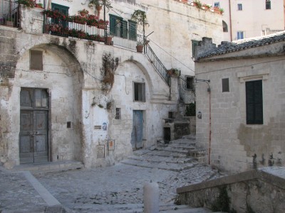 Free photo of Matera town, Italy. Matera preserves a large and diverse collection of buildings related to the Christian faith, including a large number of rupestrian churches carved from the soft volcanic rock of the region. These churches, which are also found in the neighboring region of Puglia, were listed in the 1998 World Monuments Watch by the World Monuments Fund.<br>Name of photo's author: Free-Photos.biz<br>This photo was taken in: Matera, Italy