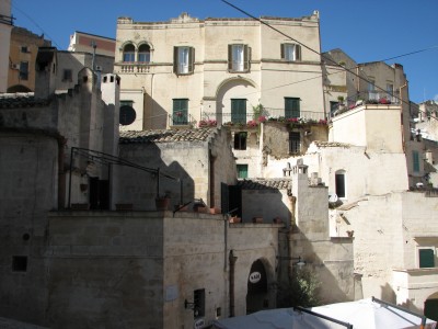 Free photo of Matera town, Italy. Matera preserves a large and diverse collection of buildings related to the Christian faith, including a large number of rupestrian churches carved from the soft volcanic rock of the region. These churches, which are also found in the neighboring region of Puglia, were listed in the 1998 World Monuments Watch by the World Monuments Fund.<br>Name of photo's author: Free-Photos.biz<br>This photo was taken in: Matera, Italy