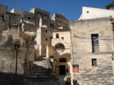 Free photo of Matera town, Italy. Matera preserves a large and diverse collection of buildings related to the Christian faith, including a large number of rupestrian churches carved from the soft volcanic rock of the region. These churches, which are also found in the neighboring region of Puglia, were listed in the 1998 World Monuments Watch by the World Monuments Fund.<br>Name of photo's author: Free-Photos.biz<br>This photo was taken in: Matera, Italy