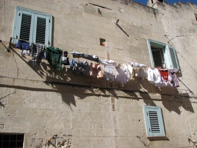 Free photo of Matera town, Italy. Matera preserves a large and diverse collection of buildings related to the Christian faith, including a large number of rupestrian churches carved from the soft volcanic rock of the region. These churches, which are also found in the neighboring region of Puglia, were listed in the 1998 World Monuments Watch by the World Monuments Fund.<br>Name of photo's author: Free-Photos.biz<br>This photo was taken in: Matera, Italy