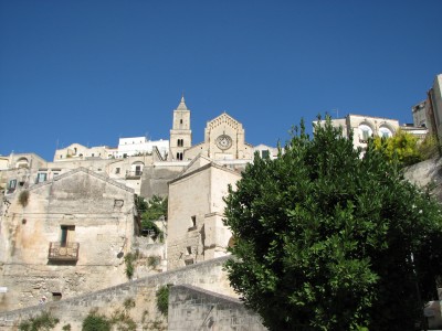 Free photo of Matera town, Italy. Matera preserves a large and diverse collection of buildings related to the Christian faith, including a large number of rupestrian churches carved from the soft volcanic rock of the region. These churches, which are also found in the neighboring region of Puglia, were listed in the 1998 World Monuments Watch by the World Monuments Fund.<br>Name of photo's author: Free-Photos.biz<br>This photo was taken in: Matera, Italy