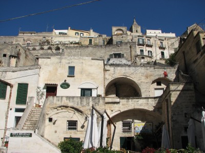 Free photo of Matera town, Italy. Matera preserves a large and diverse collection of buildings related to the Christian faith, including a large number of rupestrian churches carved from the soft volcanic rock of the region. These churches, which are also found in the neighboring region of Puglia, were listed in the 1998 World Monuments Watch by the World Monuments Fund.<br>Name of photo's author: Free-Photos.biz<br>This photo was taken in: Matera, Italy