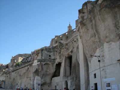 Free photo of Matera town, Italy. Matera preserves a large and diverse collection of buildings related to the Christian faith, including a large number of rupestrian churches carved from the soft volcanic rock of the region. These churches, which are also found in the neighboring region of Puglia, were listed in the 1998 World Monuments Watch by the World Monuments Fund.<br>Name of photo's author: Free-Photos.biz<br>This photo was taken in: Matera, Italy