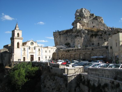 Free photo of Matera town, Italy. Matera preserves a large and diverse collection of buildings related to the Christian faith, including a large number of rupestrian churches carved from the soft volcanic rock of the region. These churches, which are also found in the neighboring region of Puglia, were listed in the 1998 World Monuments Watch by the World Monuments Fund.<br>Name of photo's author: Free-Photos.biz<br>This photo was taken in: Matera, Italy