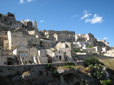 Free photo of Matera town, Italy. Matera preserves a large and diverse collection of buildings related to the Christian faith, including a large number of rupestrian churches carved from the soft volcanic rock of the region. These churches, which are also found in the neighboring region of Puglia, were listed in the 1998 World Monuments Watch by the World Monuments Fund.<br>Name of photo's author: Free-Photos.biz<br>This photo was taken in: Matera, Italy