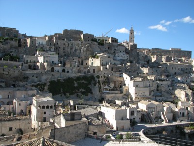Free photo of Matera town, Italy. Matera preserves a large and diverse collection of buildings related to the Christian faith, including a large number of rupestrian churches carved from the soft volcanic rock of the region. These churches, which are also found in the neighboring region of Puglia, were listed in the 1998 World Monuments Watch by the World Monuments Fund.<br>Name of photo's author: Free-Photos.biz<br>This photo was taken in: Matera, Italy