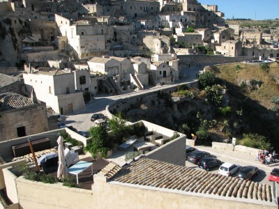 Free photo of Matera town, Italy. Matera preserves a large and diverse collection of buildings related to the Christian faith, including a large number of rupestrian churches carved from the soft volcanic rock of the region. These churches, which are also found in the neighboring region of Puglia, were listed in the 1998 World Monuments Watch by the World Monuments Fund.<br>Name of photo's author: Free-Photos.biz<br>This photo was taken in: Matera, Italy