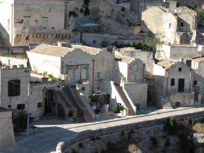 Free photo of Matera town, Italy. Matera preserves a large and diverse collection of buildings related to the Christian faith, including a large number of rupestrian churches carved from the soft volcanic rock of the region. These churches, which are also found in the neighboring region of Puglia, were listed in the 1998 World Monuments Watch by the World Monuments Fund.<br>Name of photo's author: Free-Photos.biz<br>This photo was taken in: Matera, Italy