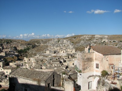 Free photo of Matera town, Italy. Matera preserves a large and diverse collection of buildings related to the Christian faith, including a large number of rupestrian churches carved from the soft volcanic rock of the region. These churches, which are also found in the neighboring region of Puglia, were listed in the 1998 World Monuments Watch by the World Monuments Fund.<br>Name of photo's author: Free-Photos.biz<br>This photo was taken in: Matera, Italy