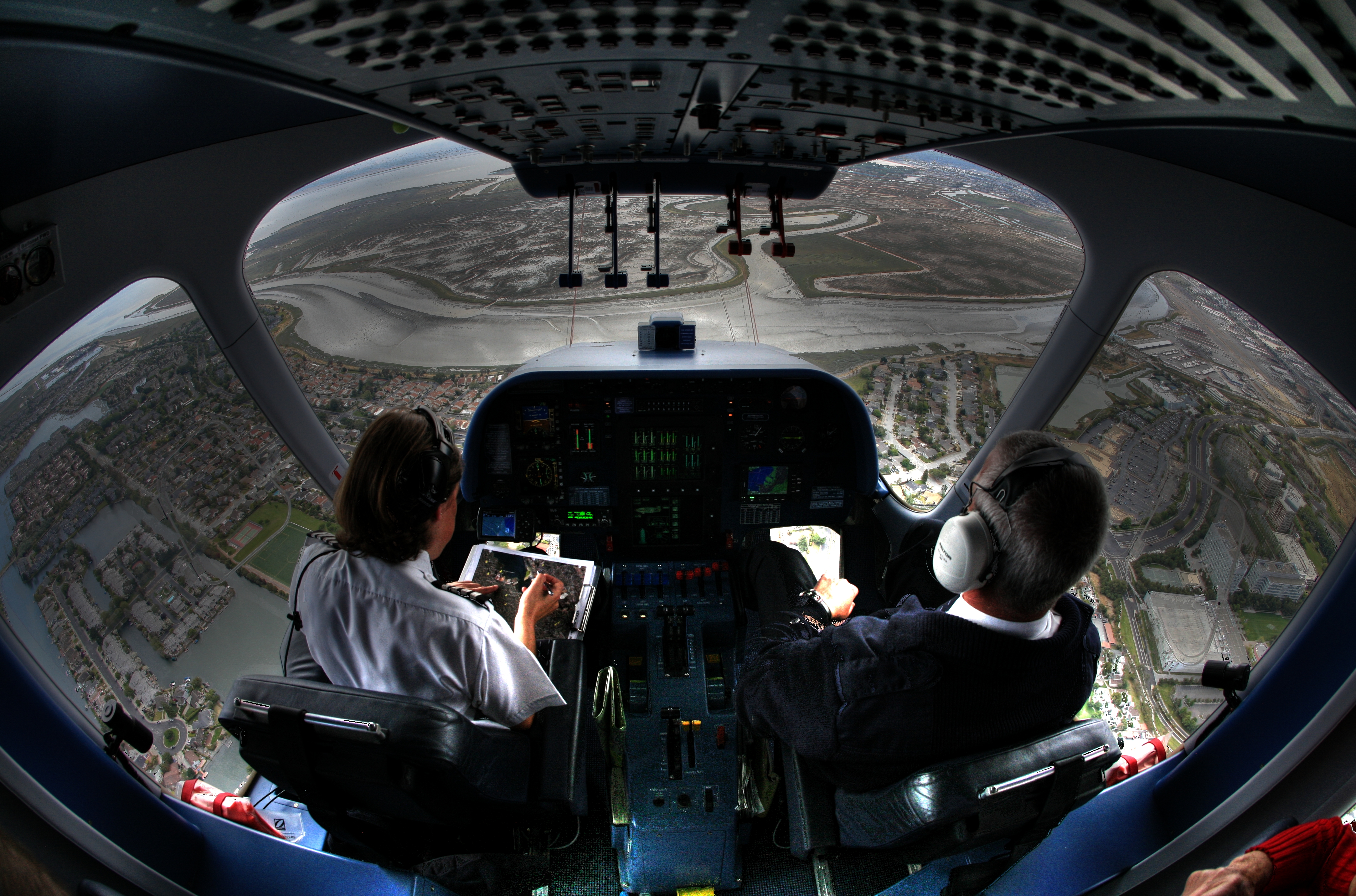 View from a blimp's cockpit during flight.
