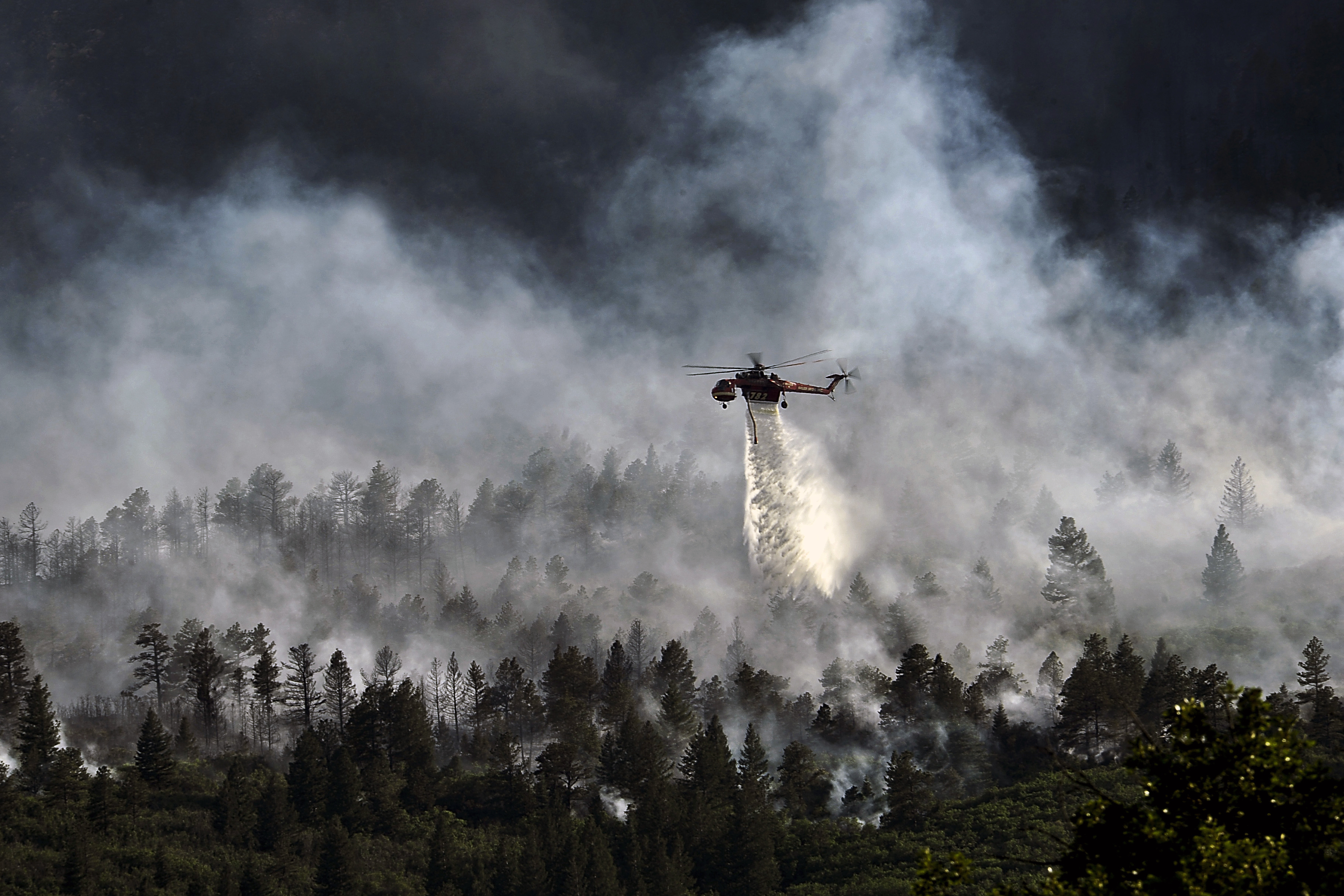 Helo dropping water on Waldo Canyon fire
